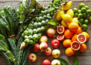 a group of fruits and vegetables on a wood surface Healthy Weight Loss Diets West Drayton